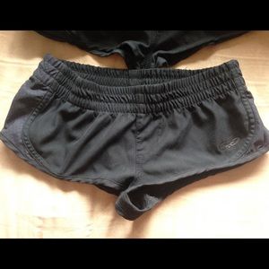 Black Nike running shorts
