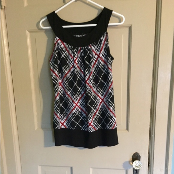 Sleeveless dressy top.