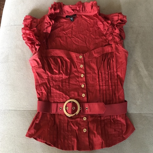 Ruffled red top.