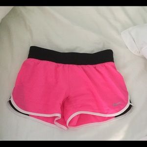 Kids pink and black nike shorts