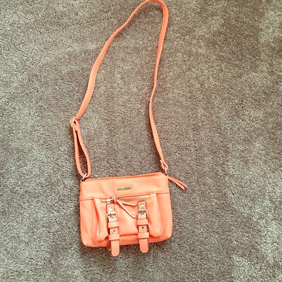 Small coral cross body bag.