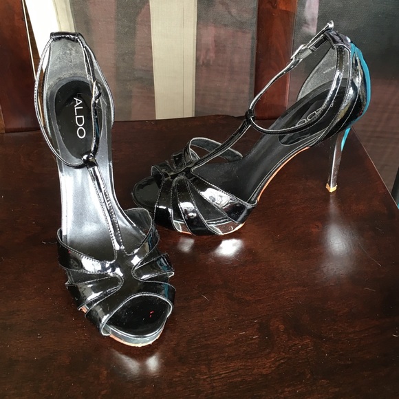 Black and silver T-strap heels