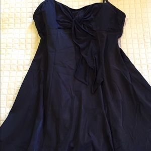 Black one piece bathing suit.