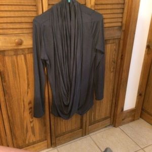 A grey cross over sweater top