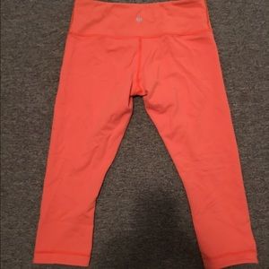 Reversible orange Lululemon crop leggings