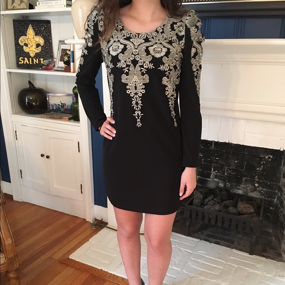 Super cute black and gold dress!