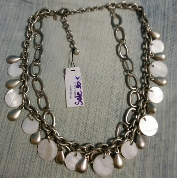 Necklace with mother of pearl accents.