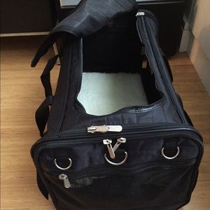 Dog carrier with wheels