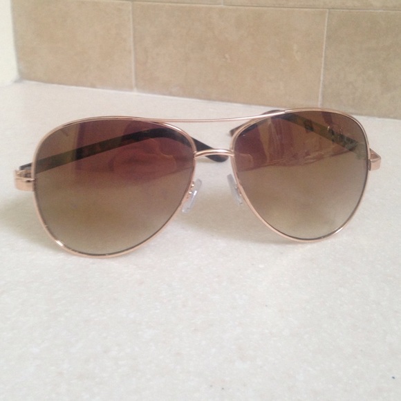 Gold rimmed Franchessca's sunglasses