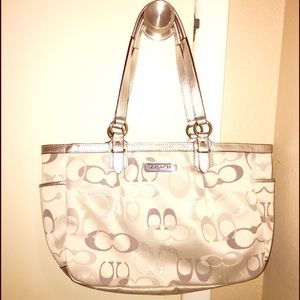 Brand new silver Coach purse- never used!