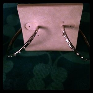 Tory Burch Crystal silver hoop earrings.