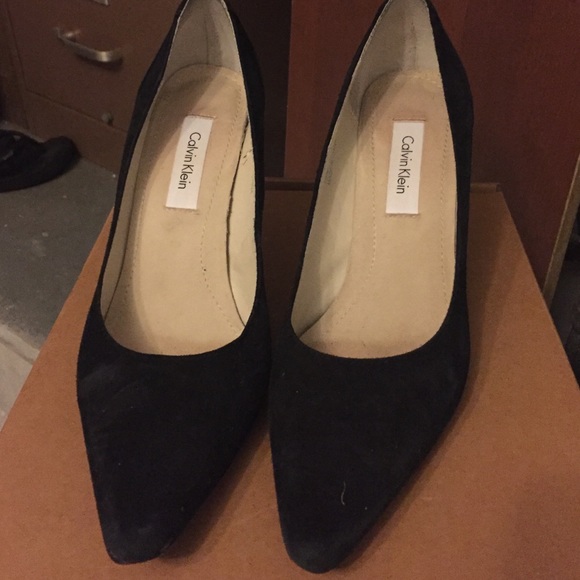 Black suede pumps