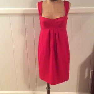 Red short/mid length low cut dress
