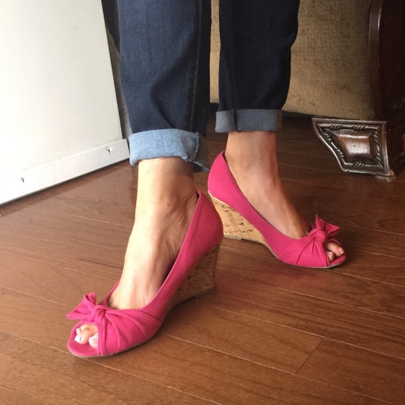Pink opened toe wedges