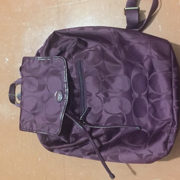 Coach sling backpack.