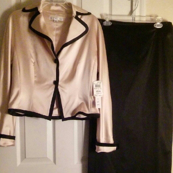 Long black skirt & platinum long sleeve jacket