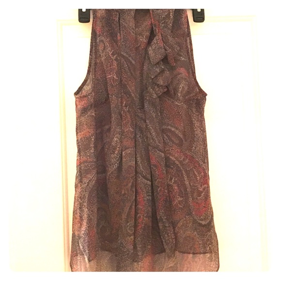 A sheer dark colored blouse