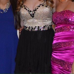 Brand new Sherri Hill homecoming dress. Worn once.