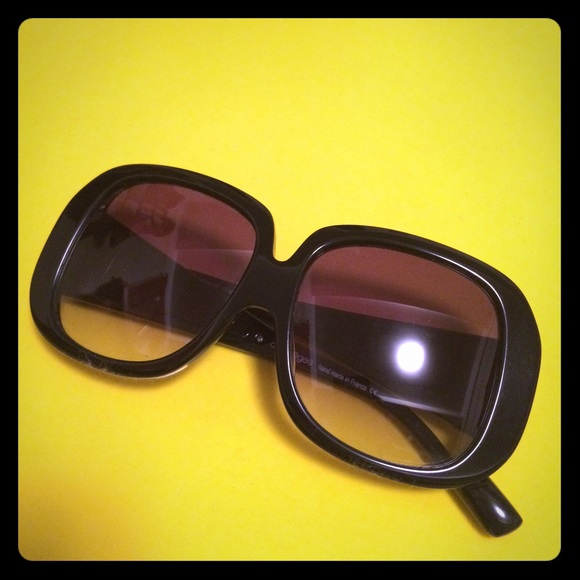 Super cool Coureges black plastic sunglasses.