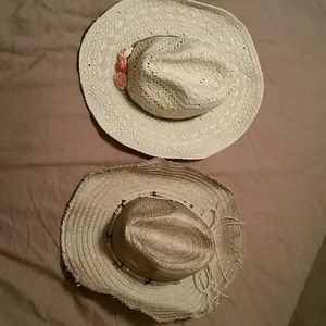 Two cowgirl style straw hats