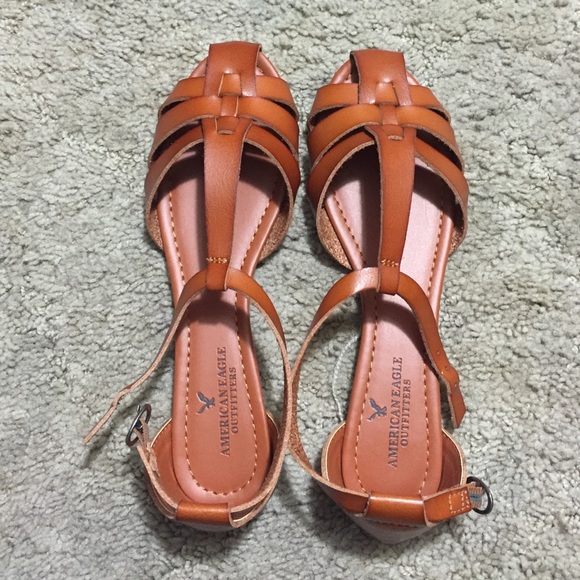 Brown braided front sandels, never used.