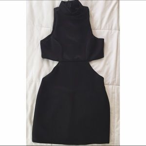 Little black dress with side slits and high neck
