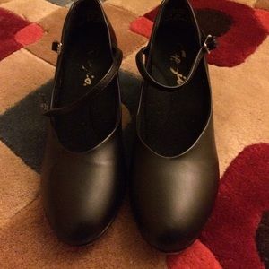 Black dance shoes.