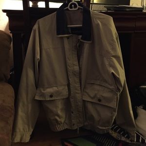 Tan and blue Windbreaker