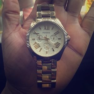 Gold fossil watch