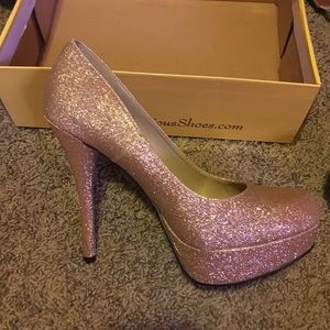 Gold stilettos about 4-4.5 heel worn once.