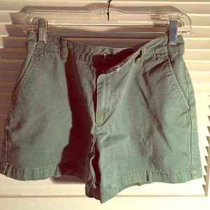 High-waist faded-green shorts