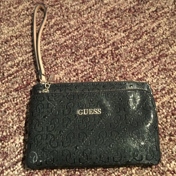 Guess Handbags - Guess Black 6" Clutch.. No signs of wear!!