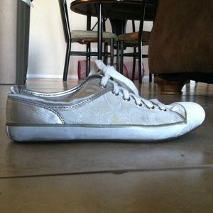 White and silver Coach shoes