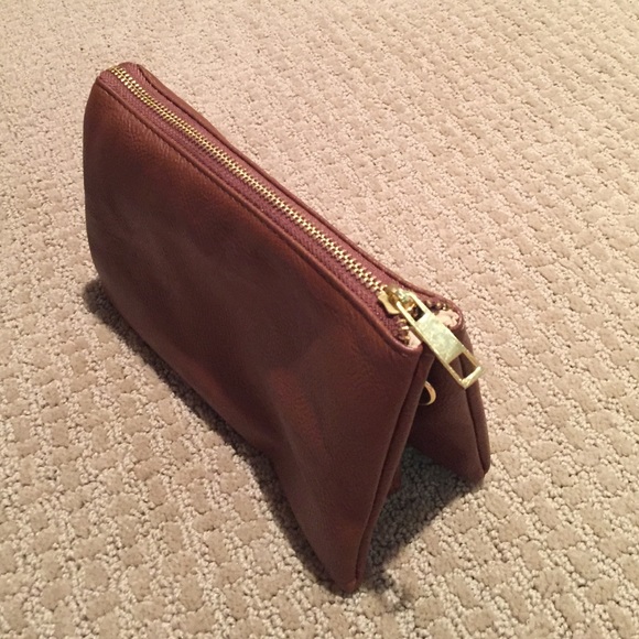 Brown leather clutch