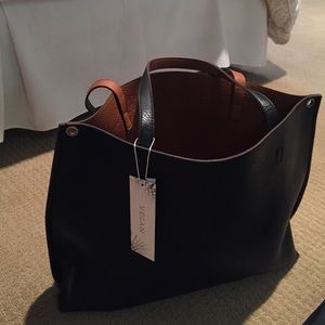 Reversible leather tote