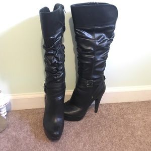 Like new, black Guess heeled boots