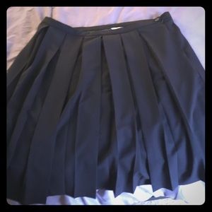 Black pleated skirt. Modcloth