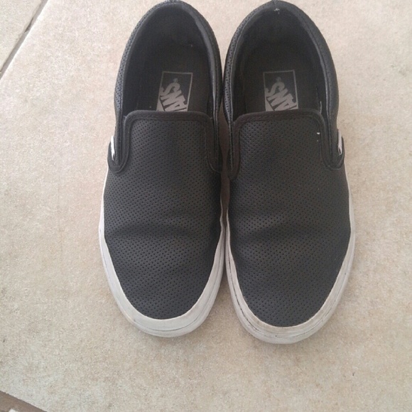 Black leather slip on Vans.
