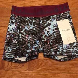 NWT Lululemon spandex. Size 4 black, purple, &blue