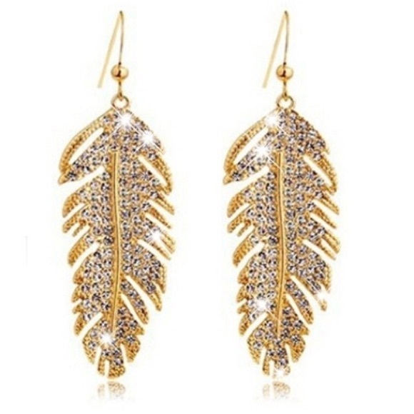 Feather earrings for the ladies 18k gold