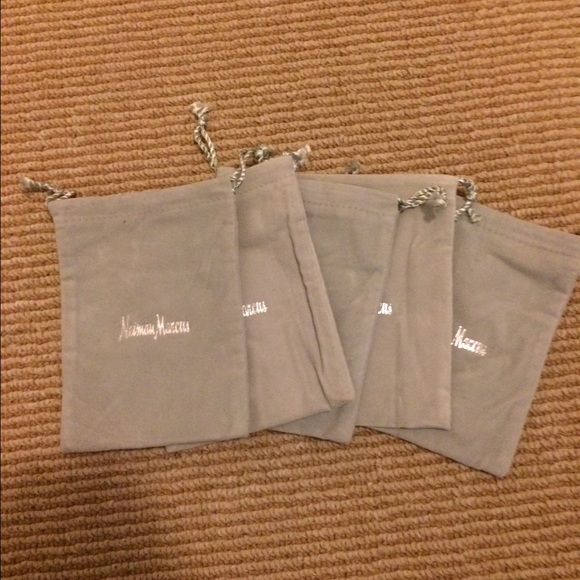 5 Neiman Marcus bags.