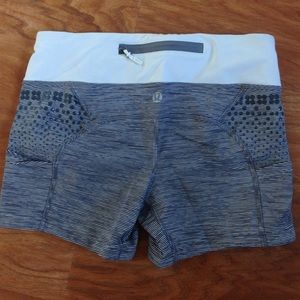 Gray and white lululemon workout shorts