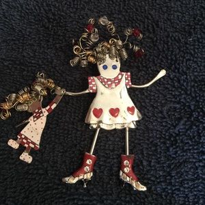 Handmade little girl pin with doll in silver