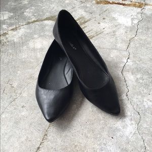 Black faux-leather pointed toe flats