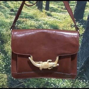 Leather cross body bag with alligator snap