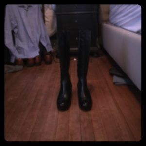 Tall black boots
