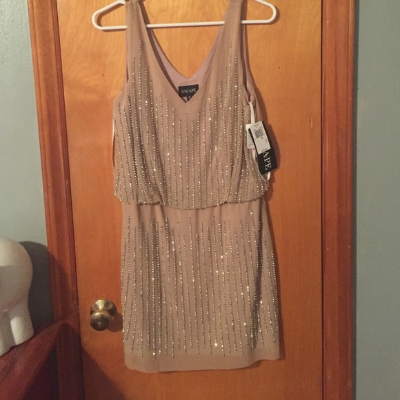 Nude colored dress new with tags!