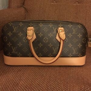 Brown monogram handbag