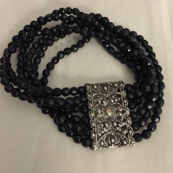 Beaded bracelet with antique accent