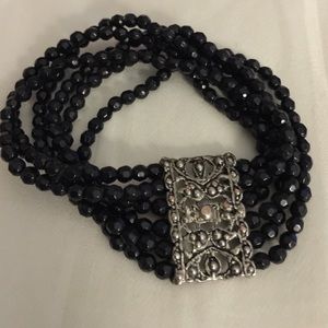 Beaded bracelet with antique accent